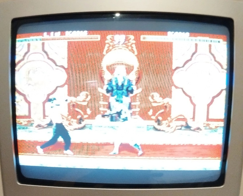 A picture of a television set displaying a scene from MK1. There are significant border on the top and bottom of the image.